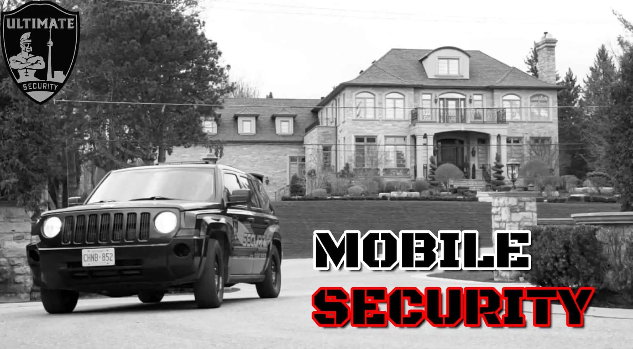 A black SUV, with the words "mobile security", drives in front of a house.