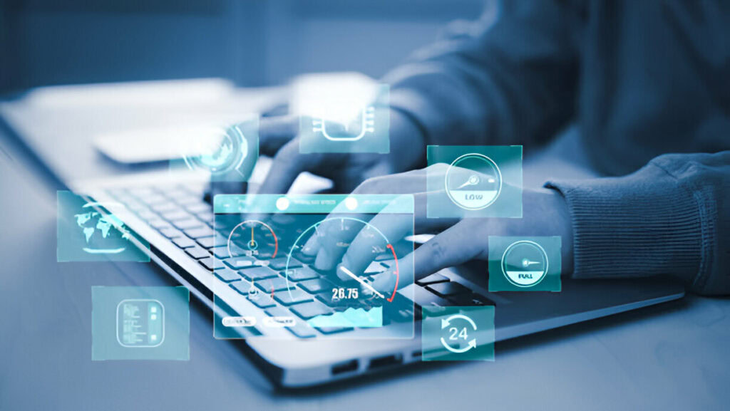 Person typing on a laptop with various digital icons and graphs overlaid, indicating data analysis or digital monitoring, while implementing essential security updates.